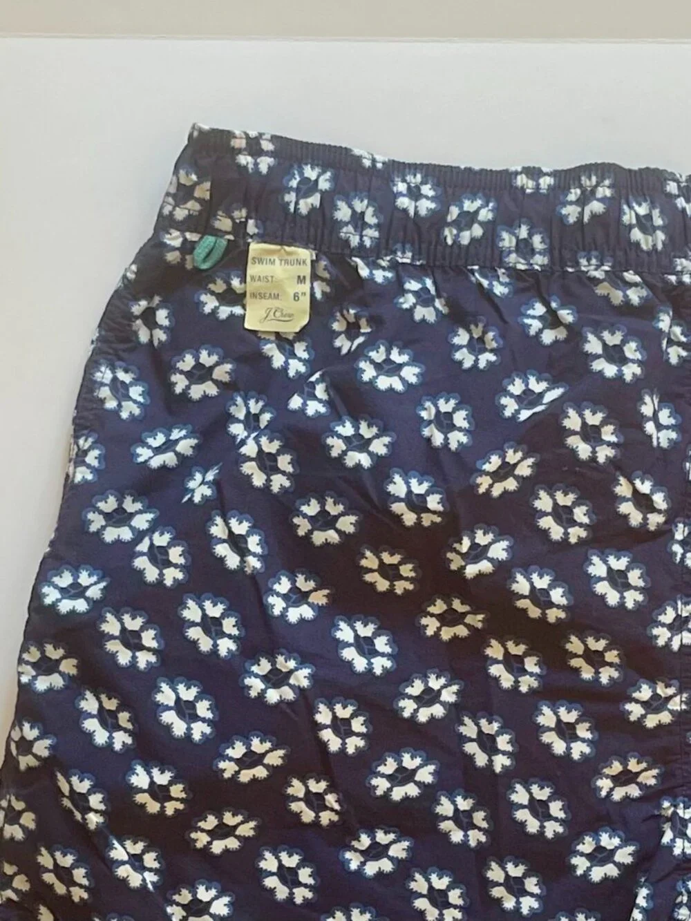 J. Crew men's swim shorts, navy with white flowers, size Medium